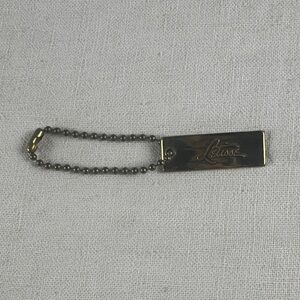 Letisse double sided gold bag charm tag